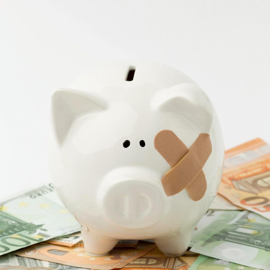 Sparschwein mit Pflaster